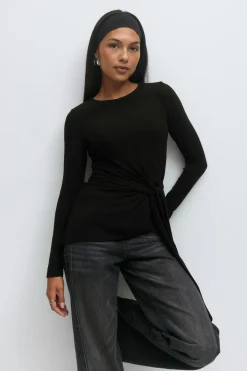 Asymmetric tie top