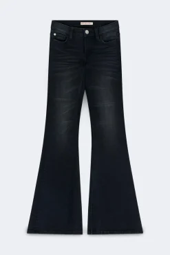 Glow low flare petite jeans