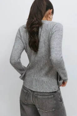 Knitted peplum cardigan