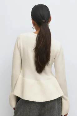 Knitted peplum cardigan