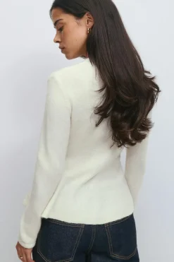 Knitted peplum cardigan