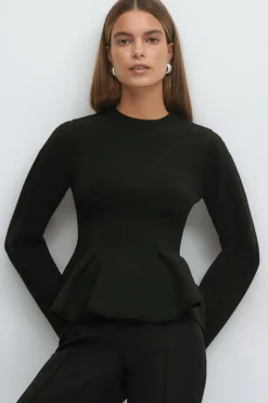 Knitted peplum top