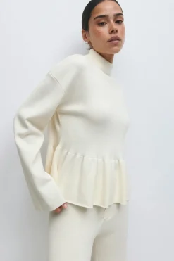 Knitted peplum top