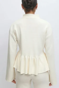 Knitted peplum top