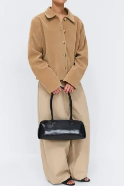 Patent shoulder bag