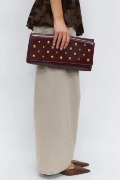 Patent studded clutch