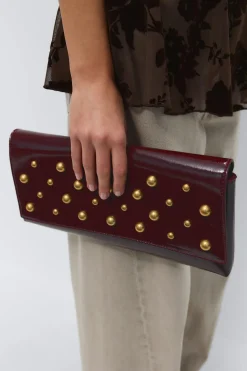 Patent studded clutch