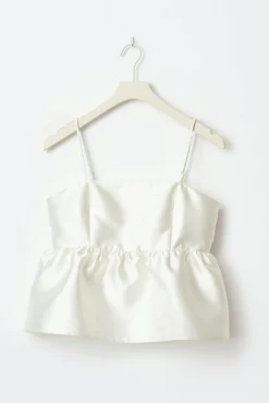 Shiny peplum top