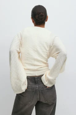 Textured wide sleeve top