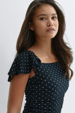 Y open back frill top