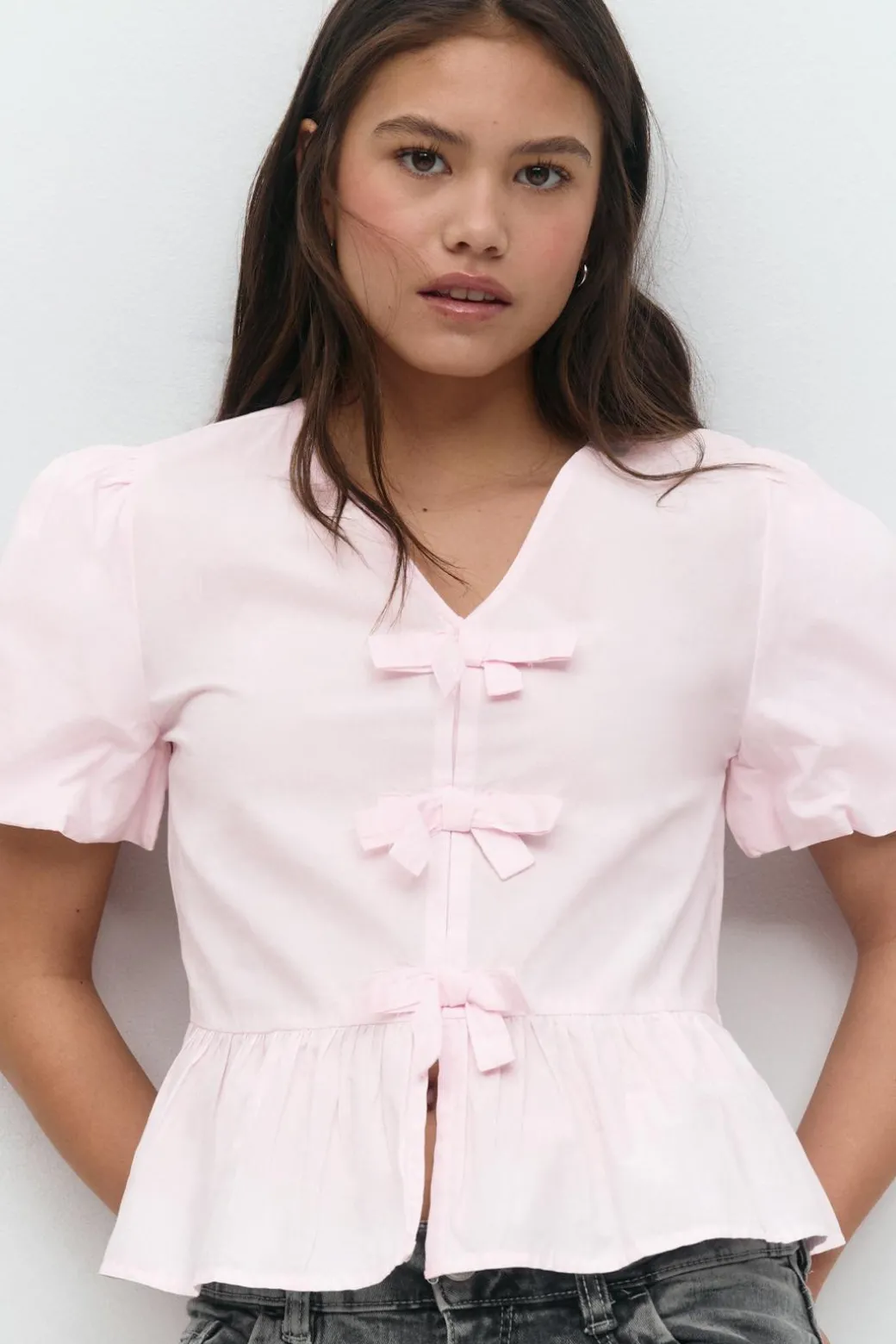 Y tie peplum top